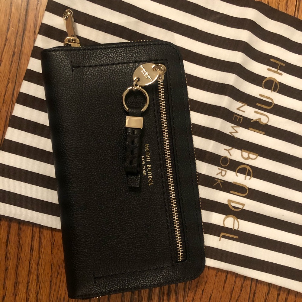 Henri Bendel black leather wallet/gold hardware.